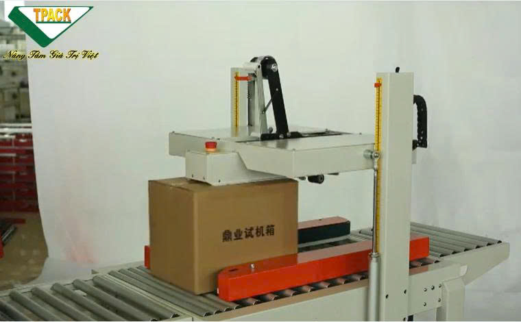TPDFC6050A là máy dán băng keo thùng carton tự động,